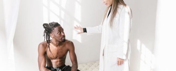 Doctor and patient discussing treatment options in a bright room.